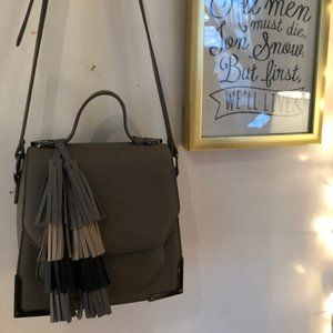 Grey cross body bag with tassel